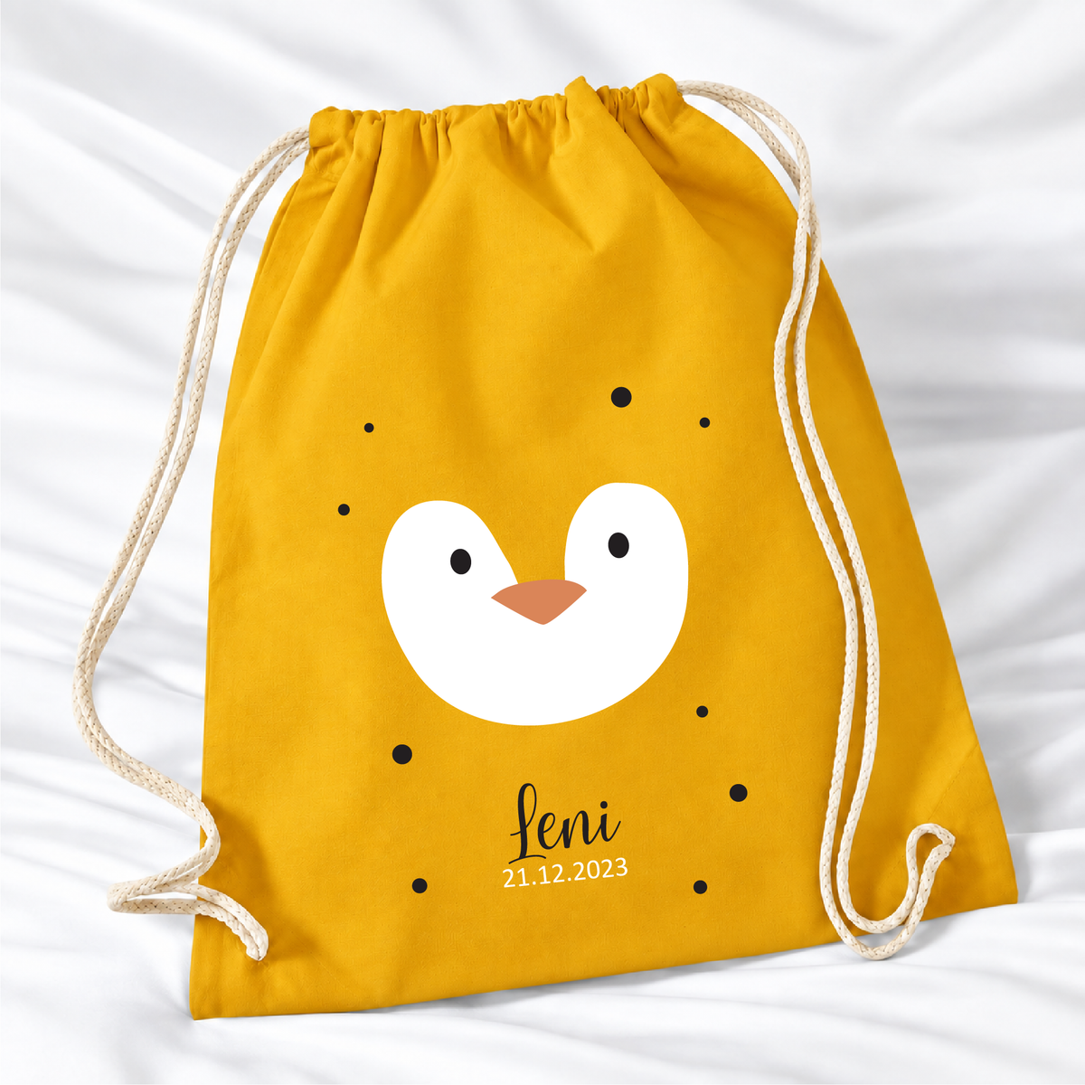 Personalisierter Pinguin-Turnbeutel in Senfgelb mit Wunschname – Standard 140 g/m²
