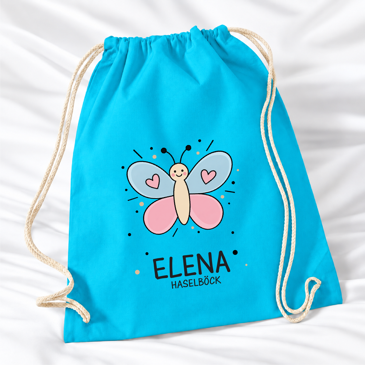 Personalisierter Schmetterling-Turnbeutel in Hellblau mit Wunschname – Standard 140 g/m²